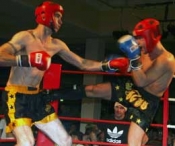 It was bill as Judgement Day in Dublin - pictured here (right) Belfast's Gareth Mosgrove lost in a close low kick style bout in his first time fight.