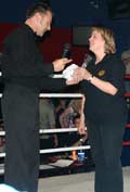 Billy murray presenting  Maggie Burchell with a gift from the promoter for all her hard work on the show