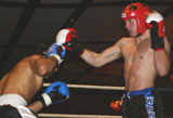 Kyle hits back with a hard right hook, but it was not enough to stop the tough Fernando Viera