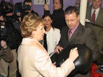 President McAleese signs a glove  for the prokick gym