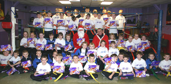 Santa had one of his helpers with him - he was called Bobby M, Young Bobby helped give out some presents to all the kickboxing mad kids who all have worked hard this year.