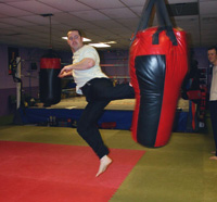 Ronan McCluskey in jump kick action