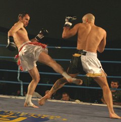 Ian lands a nice low kick