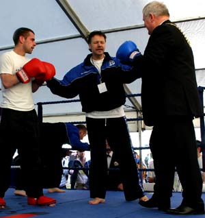 Murray, head coach of the Prokick Gym in east Belfast, and current world featherweight champion, Gary Hamilton, both have thrown their weight behind the campaign and today joined forces with the Lord Mayor and Miss United Kingdom, Lucy Evangelista, to together put the boot into smoking.