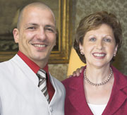 Carl Emery with the President Mary McAleese 