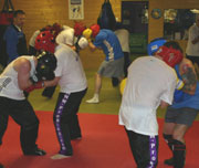 body boxing on the floor before they step into the ring