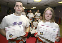 It'sa family affair at the Prokick gym when Father & Daughter Robert and Rebecca pass their green belts