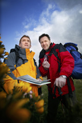 Tony Ruddy, Director of Ark Housing Association and former World Kickboxing Champion, Billy Murray, get kitted out for the 2005 '4 Peaks (Ireland) Challenge for Homelessness' 