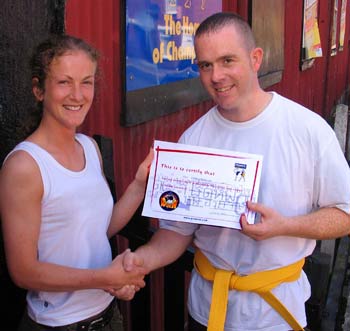 The north-Belfast ‘blind man’ is now focussing on a fighting career in his wife’s sport after attaining his first-grade yellow belt last week.