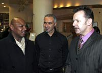 Billy Murray with WKN world president Stephane Cabrera greets boxing legend Marvelous Marvin Hagler