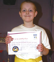 George Gibson passes i=his orange belt