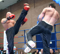 Martin fires off a high kick in the 4 man heavyweight bouts