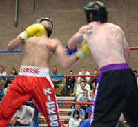 Staurt lands a nice left hook to the head of Swiss  fighter Fathallah 