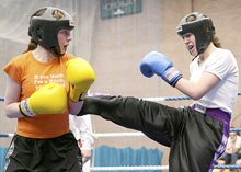 Tracy lands a kick with Nicky Whitty  of Kilkenny the match was scored a draw 