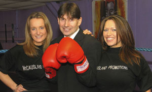 Paul McCausland, with two boxing fans