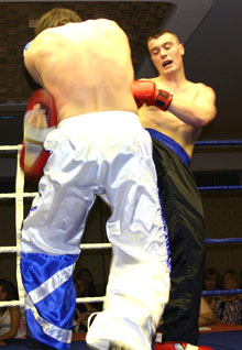 Andrew Grimason lands a hard kick