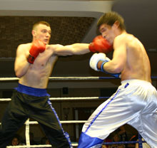 Andrew lands a hard left jab