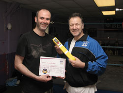 Joe Lindsay finally relaxes with Billy Murray after getting his Yellow Belt