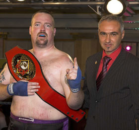 James with WKN president Stephane Cabrera at the Hilton last October where he won the super heavyweight British title