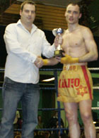 Ian receives his trophie from Sponsor Lee Madden