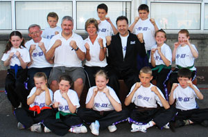 The ProKick kids along with Brookland’s head Mr D McCartney and his assistant Mrs Clare Walker 