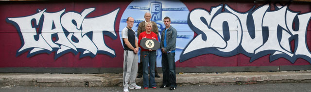 East verses South - L-R Contender Jamesy Gorman, promoter Jane Wilton from Belfast Promotions, and kickboxing king-pin Gary Hamilton are all over seen by BBB of C's general secretary for Northern Ireland, John Campbell.