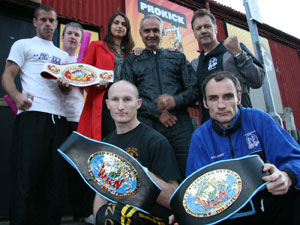 Group outside Prokick gym, (L-R BackRow) WKN world champion Gary Hamilton, Schwarzkopf General Manager Brendan Thompson, Romanian TV Executive Ramona Negoita, WKN President Stephane Cabrera, Promoter Billy Murray, (FrontRow) WKN Celtic Darren Dougan and European champion Ian Young