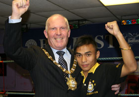 Belfast’s Lord Mayor with one of the young boxers who will compete this Friday.