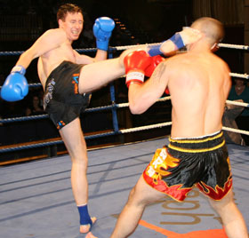 Germany's Steve Schnorrbusch lands a hard high kick