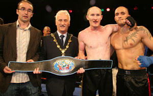 L-R, Ryan Dougan of Vision Design Architectural & Planning Services that sponsored Darrens bout, with Derry City Mayor Drew Thompson, Darren Dougan and Germany's David Wachs