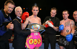 Derry City's Mayor Drew Thompson presents the European title belt to Ian Young