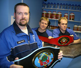 WKN Celtic Nations and Irish champion Big James Gillen with Mark Henry and Stevie McGuigan at Well-Fit