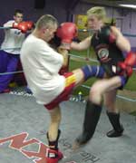 Gary Noade lets her have itwith a front kick