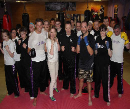 Welcome back the McCabe's to the first class of 2013, Geraldine, centre in white and hubby Alan (right) to head coach Billy Murray