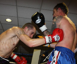 Foster body punch - Foster, Coicio and Samantha Robb fought in London at Marty Cox event at the Holiday Inn hotel, Manor Lane in Maidenhead.