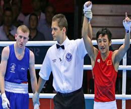 China's Zou Shiming beats Paddy Barnes in the light-flyweight semi-finals in London's 2012.