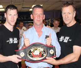 ProKick fighter, Johnny 'Swift' Smith (left) receives backing for world Glory. PPLK have backed Prokick events in the past and Billy Murray (right) is delighted that Mr Fyfe (center) & Co are helping again.