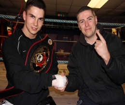 ProKick's Karl McBlain gets coverd from  Belfast Insulation Mr Ryan Gilpin for his Big fight at KICKmas 2013