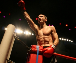 A delighted Ian Young on top of the world after winning the WKN light middleweight kickboxing low leg kick world title