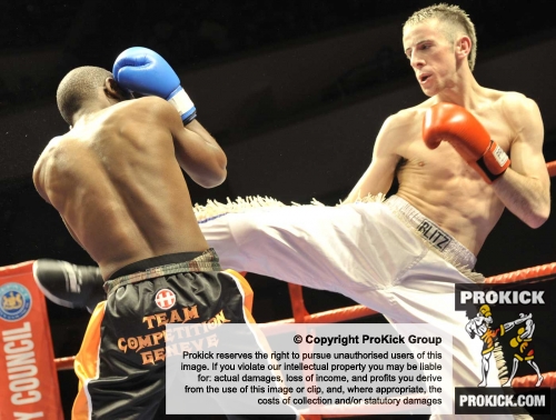 Patrick Kinigamazi takes a kick from Alexander White