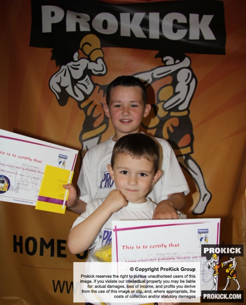 Team mates pass prokick grading on Sunday July 8th - the two buddies  Ethan took his yellow belt whilst Riley was awarded his Orange belt.