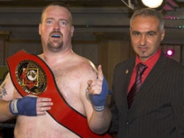 WKN Celtic Nations Champion Big James Gillen with WKN president Mr Stephane Cabrera