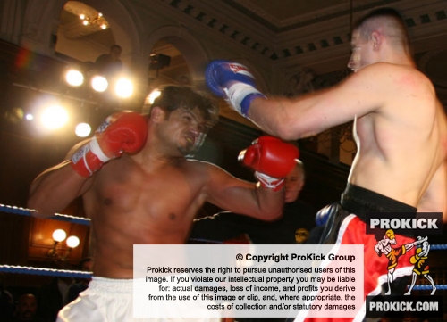 It was tit-for-tat war from round one to round twelve - Riyadh Al Azzawi (left) about to land the right hand that dropped the Pol Tomasz Borowiec
