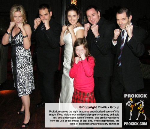 The family's six Prokick members lined up in fighting stance on the dance floor!