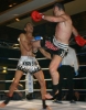 Ian Young (Right) lands a hard jumping roundhouse kick to Bosompen