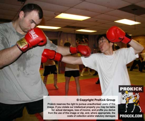 English teacher Hiro, punches Slovakian super heavyweight Giant Miro Herda.