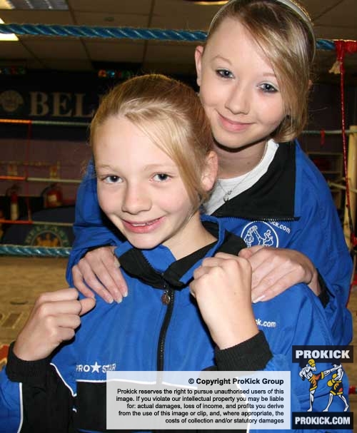 A young Prokick kickboxer, Alex Catherwood with her sister Alana at the ProKick gym