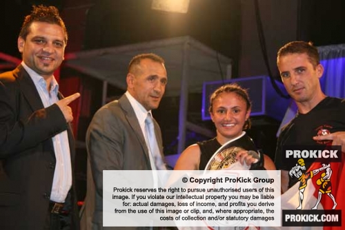 Ruth Tanti pictured here with trainer Mr Noel Mercieca (right) WKN men L-R  Mr Emil Irimia and Mr. Osman Yigin. Ruth Tanti out-pointed the tough Nuura Mohamed Sayed Ahmed from Egypt
