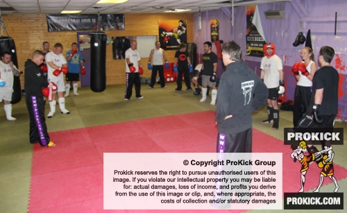The new ProKick sparring group listen in to head coach Mr Murray before they begin