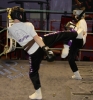 Jamie Phillips and Saskia Connolly sparring together on the last test of day 1 of the Junior Black Belt  Grading.